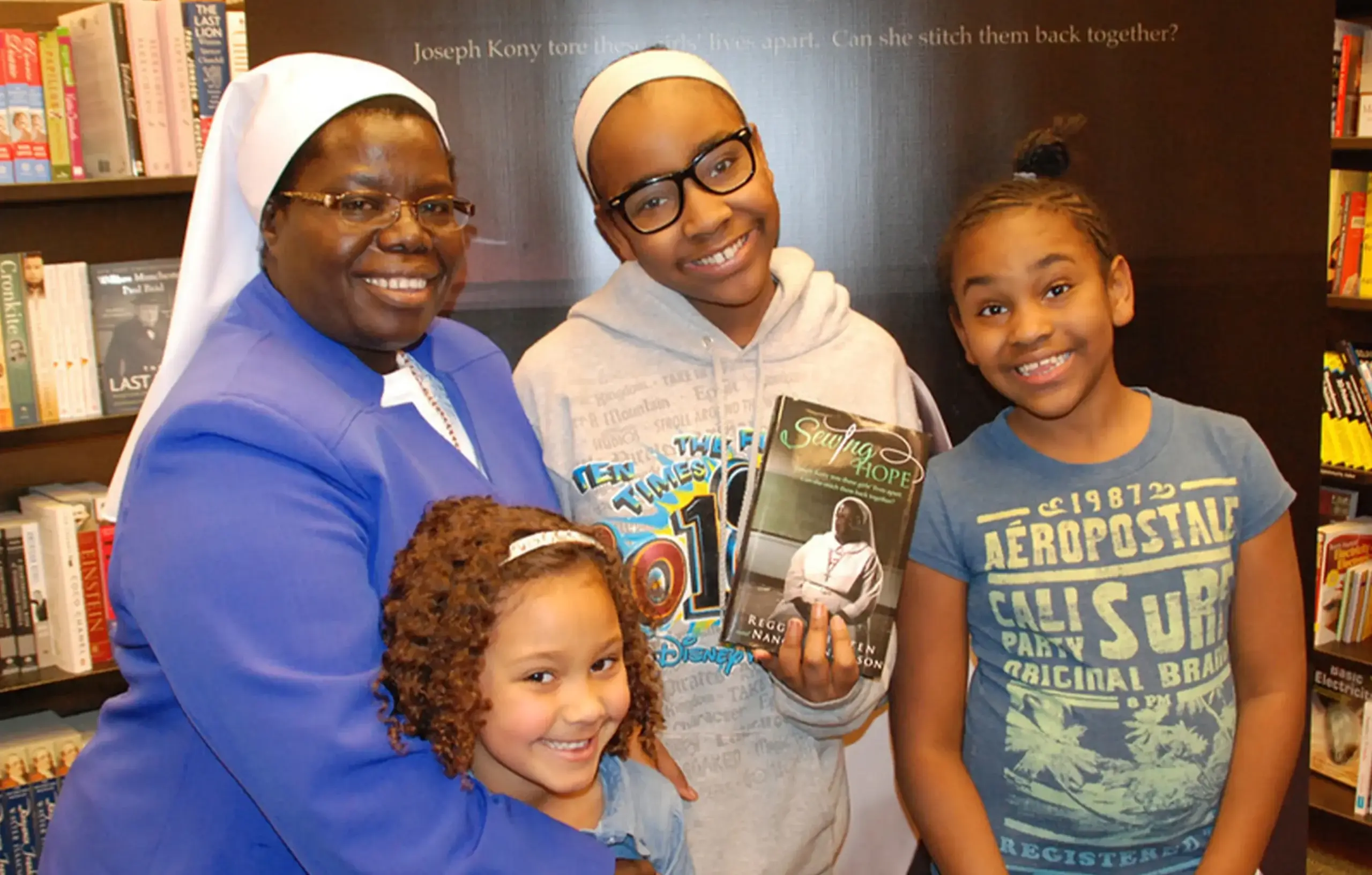Sister Rosemary with children in bookstore